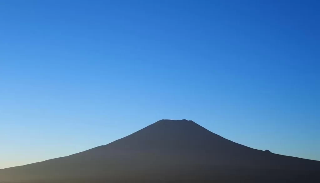 Image of Mount Daisen's silhouette against a clear blue sky