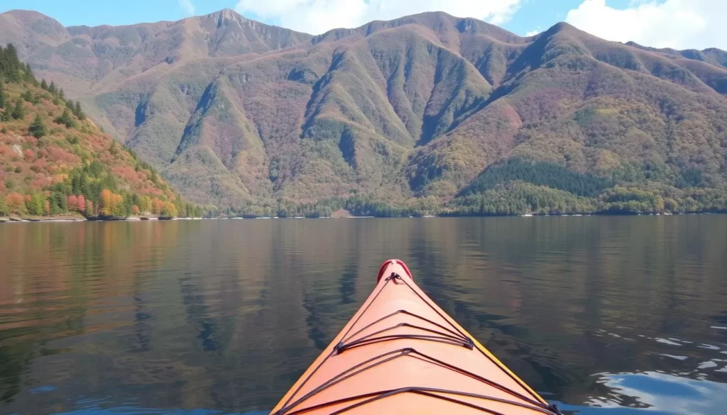 Serene kayaking on Lake Shikotsu surrounded by lush mountains