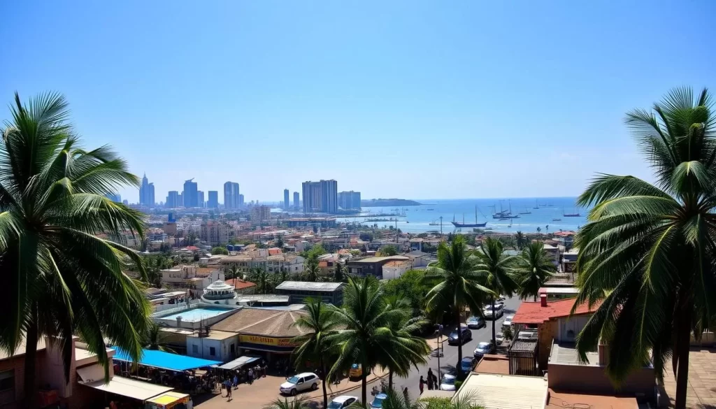 A panoramic view of Dar es Salaam's vibrant cityscape under a bright, clear sky. In the foreground, bustling streets lined with colorful buildings, lively markets, and palm trees sway gently in the warm breeze. The middle ground features the iconic skyline of towering high-rises and modern architecture, while the background is dominated by the glistening waters of the Indian Ocean, dotted with traditional dhow boats. Capture the energetic atmosphere of this thriving coastal metropolis, showcasing its blend of modernity and enduring Tanzanian culture.