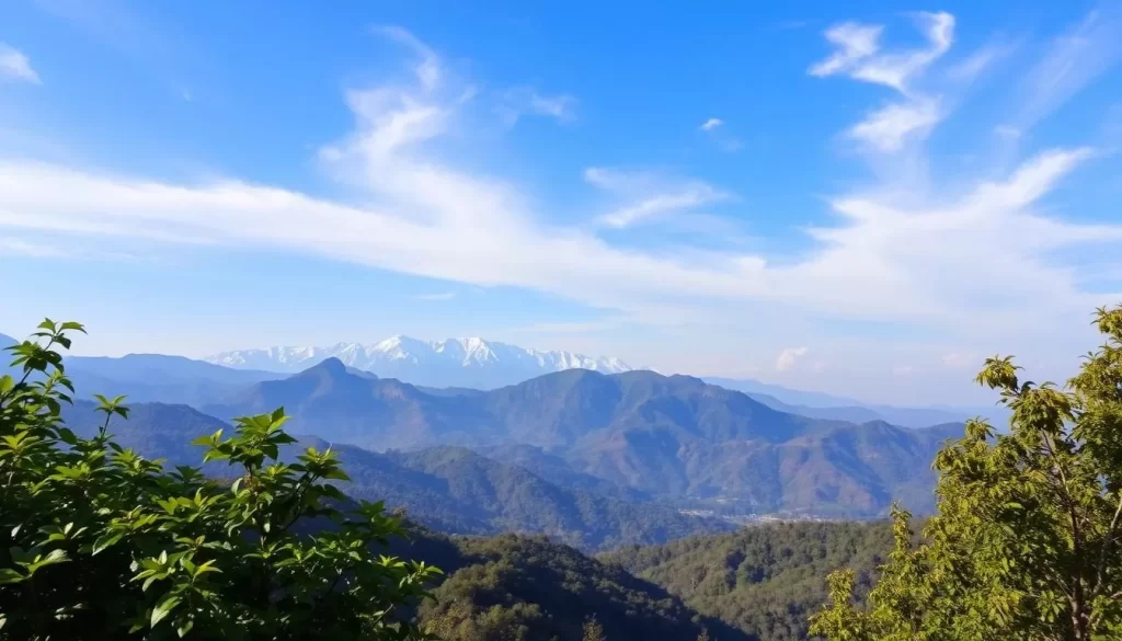 A serene panorama of Chhattisgarh's distinct climate seasons. In the foreground, a lush, verdant landscape with vibrant green foliage, gently swaying under warm sunlight. Towering mountains rise in the middle ground, their peaks dusted with a light covering of snow, hinting at the transition to winter. In the distance, a clear azure sky dotted with wispy clouds, casting soft shadows upon the rolling hills below. The scene conveys a sense of tranquility and balance, showcasing the diverse and ever-changing climate that defines the region throughout the year.