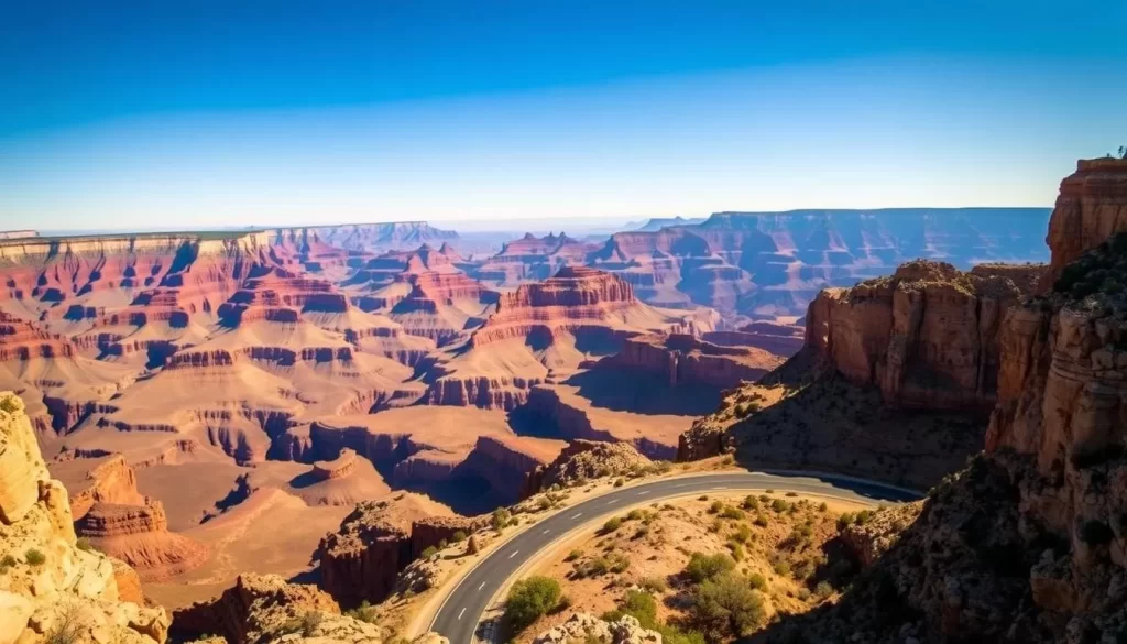 A stunning panoramic view of the iconic Grand Canyon scenic drives. In the foreground, a winding road cuts through the rugged, sun-dappled terrain, leading the eye towards the vast, majestic chasm. The middle ground showcases the canyon's layered geological formations, their vibrant colors and textures accentuated by warm, golden sunlight. In the distance, the seemingly endless expanse of the Grand Canyon stretches out, its deep, shadowy depths contrasting with the bright, cloudless sky above. The scene conveys a sense of tranquility and awe, inviting the viewer to embark on an unforgettable journey through this natural wonder.