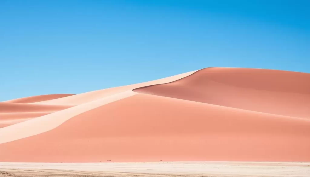 Generate an image of Coral Pink Sand Dunes State Park with vibrant pink sand dunes and a blue sky.