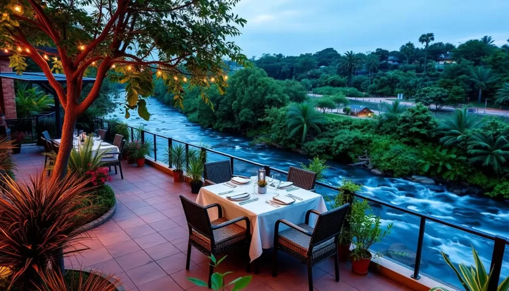 Generate an image of a serene outdoor dining area with a view of a river, surrounded by lush greenery.