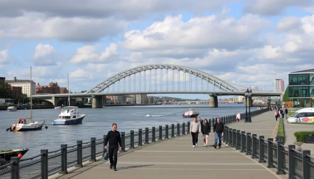 Generate an image of the Belfast Harbor Walk with the Armistice Footbridge in the background.