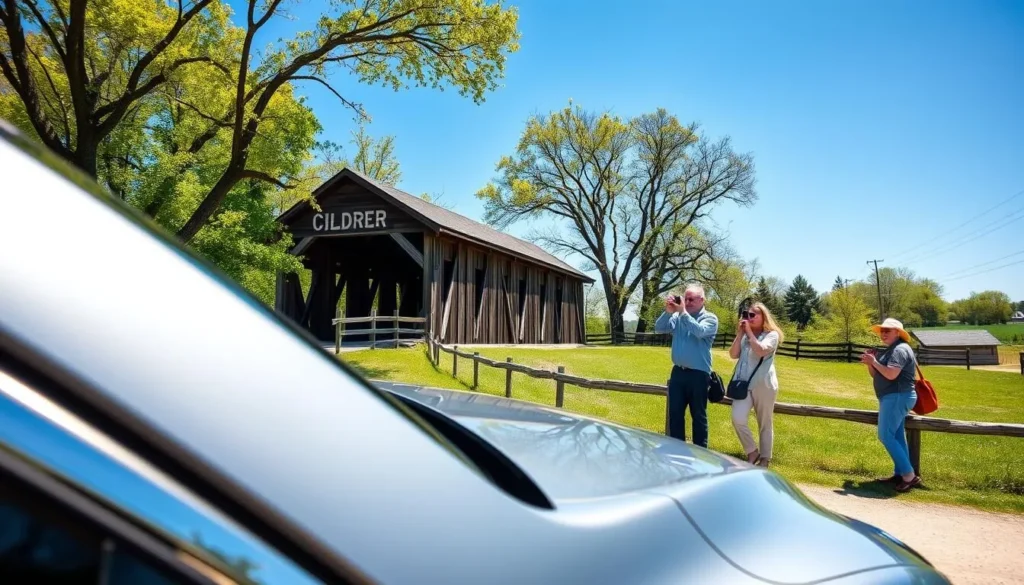 A car parked near Cedar Bridge in Winterset with visitors taking photographs on a sunny day A car parked near Cedar Bridge in Winterset with visitors taking photographs on a sunny day