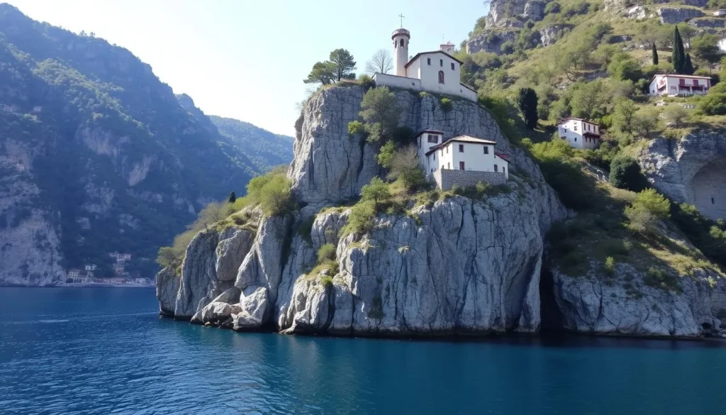 Generate an image of the Hermitage of Santa Caterina del Sasso clinging to a steep rocky cliff directly above the water.