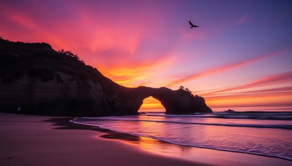 Natural Bridges State Beach in Santa Cruz County with its famous rock arch formation at sunset Natural Bridges State Beach in Santa Cruz County with its famous rock arch formation at sunset