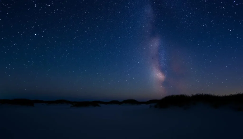 Night sky photography at Assateague Island, Delaware showing stars over beach Night sky photography at Assateague Island, Delaware showing stars over beach