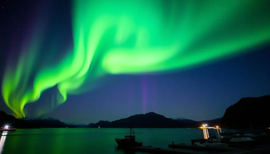 Northern lights display over Dutch Harbor in fall with reflections on water