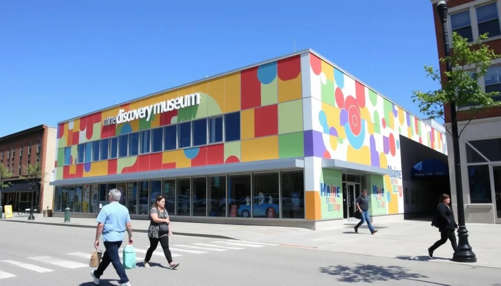 The Maine Discovery Museum in downtown Bangor with its colorful exterior and interactive exhibits visible through windows The Maine Discovery Museum in downtown Bangor with its colorful exterior and interactive exhibits visible through windows