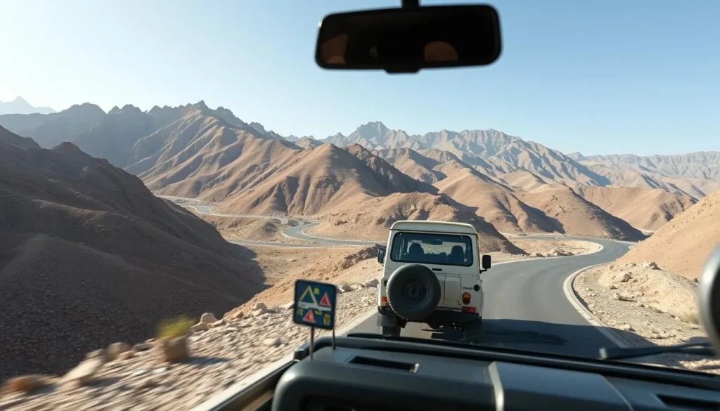4x4 vehicle driving on a scenic mountain road in Jebel Akhdar, Oman