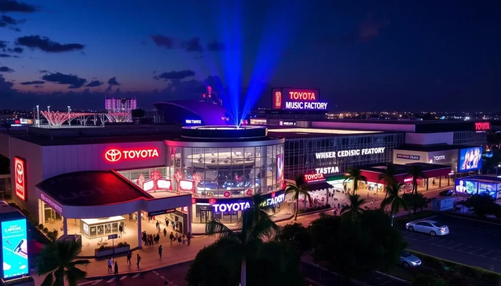 An image of the Toyota Music Factory complex at night, with vibrant lights and a lively atmosphere.