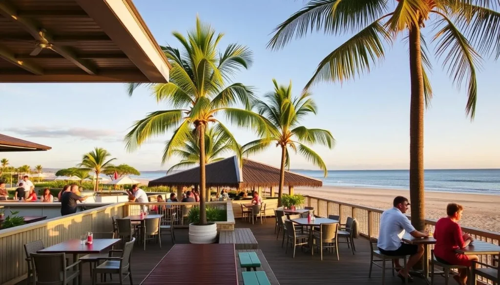 Dundee Beach Tavern with outdoor seating area and ocean views
