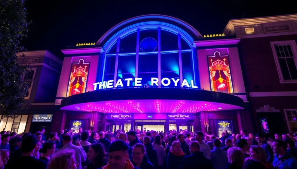 Generate an image of the Theatre Royal Plymouth's exterior at night, with bright lights and a crowd of people waiting to enter.