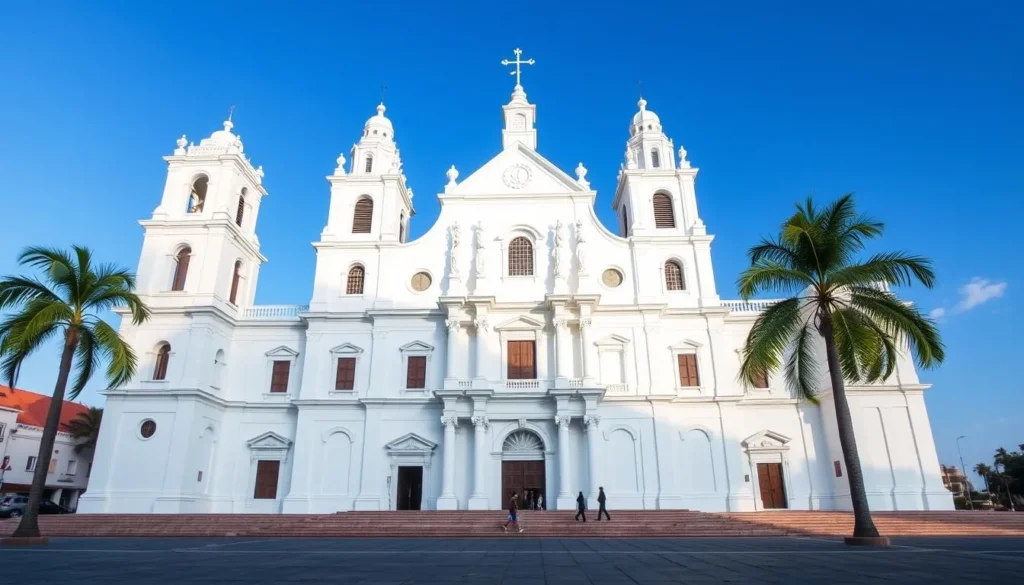 White facade of León Cathedral with people walking in the plaza in front
