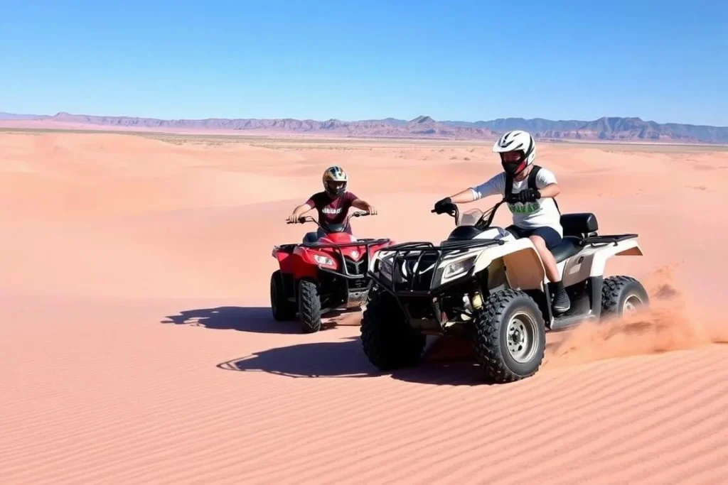 ATV riders exploring the vast terrain of Coral Pink Sand Dunes State Park, Utah ATV riders exploring the vast terrain of Coral Pink Sand Dunes State Park, Utah