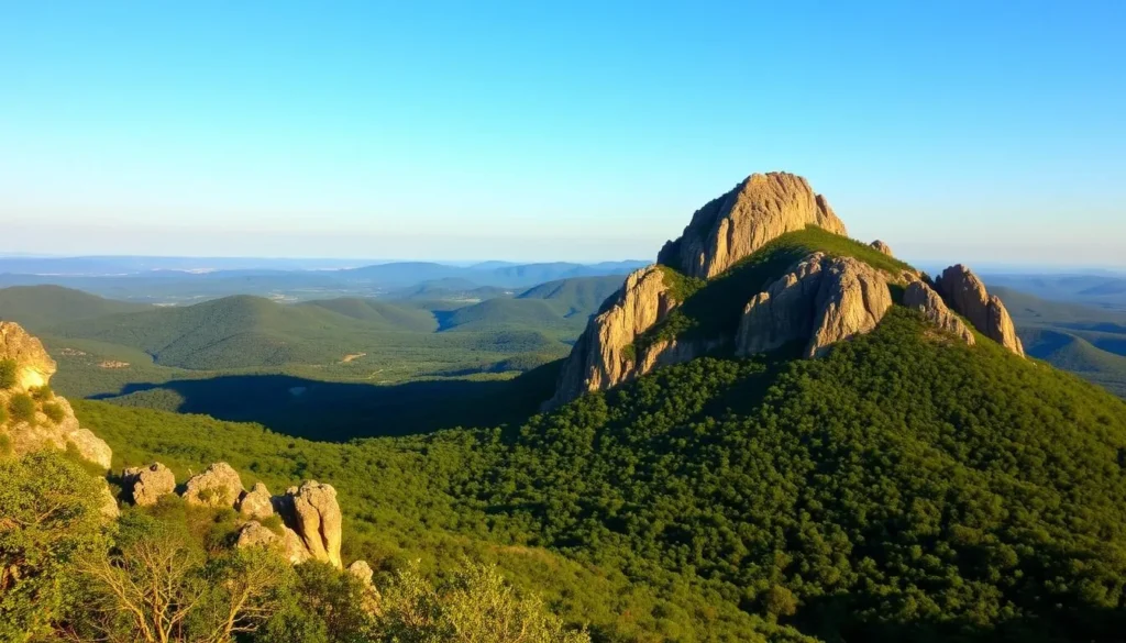 An awe-inspiring vista of Mount Magazine, Arkansas's highest point, soaring majestically against a clear azure sky. In the foreground, lush green forests and rugged rock formations create a captivating natural landscape. The warm sun casts a golden glow, illuminating the dramatic cliffs and casting long shadows across the rugged terrain. In the distance, the rolling hills of the Ozark Mountains stretch out, blanketed in a verdant tapestry. Capture the grandeur and tranquility of this remarkable natural wonder, inviting viewers to discover the beauty and serenity of Arkansas's highest peak.
