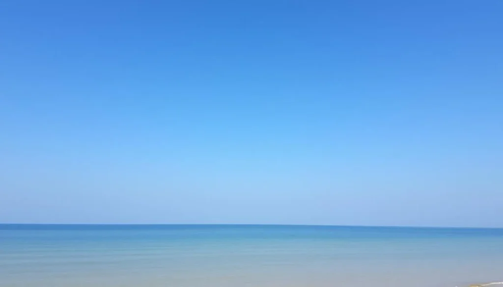 Image of Mypadu Beach with clear blue skies and calm waters