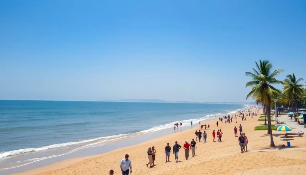Kuakata beach during the dry season showing clear blue skies, calm waters, and tourists enjoying the perfect weather