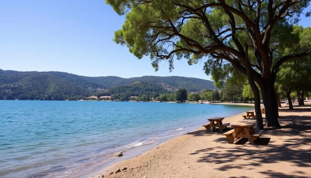 Lake Temescal Oakland California things to do - view of the lake shore with picnic areas and trees