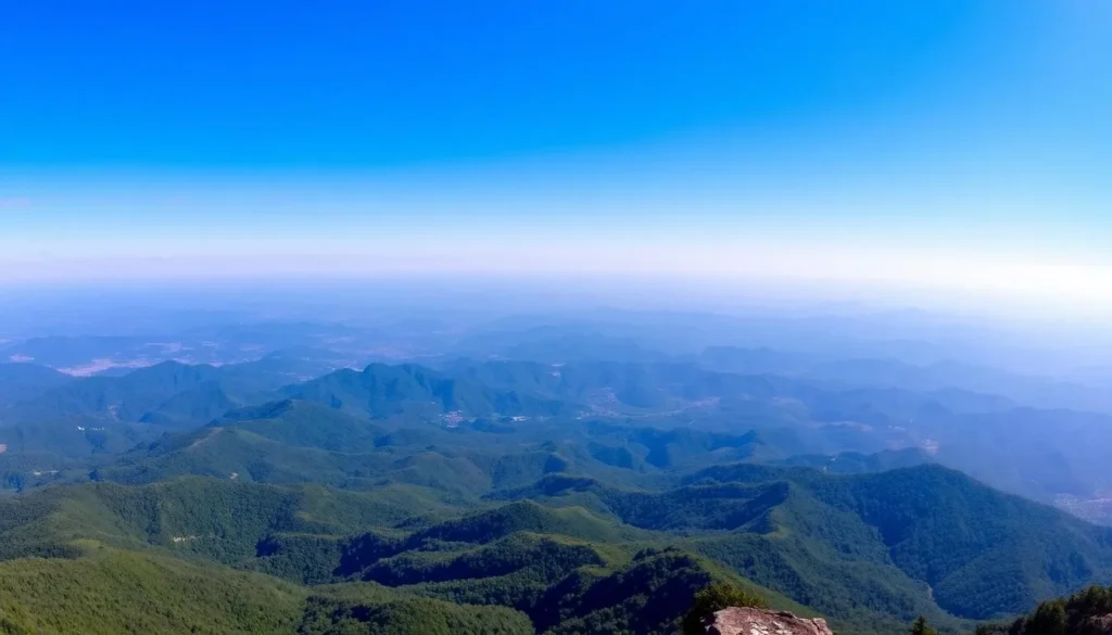 Panoramic view from Dumlong Peak summit showing surrounding mountains and valleys