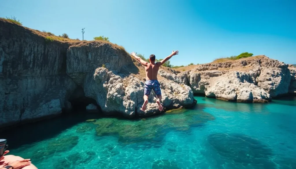 Person cliff jumping from Molave Cliff Diving Resort into clear blue waters below