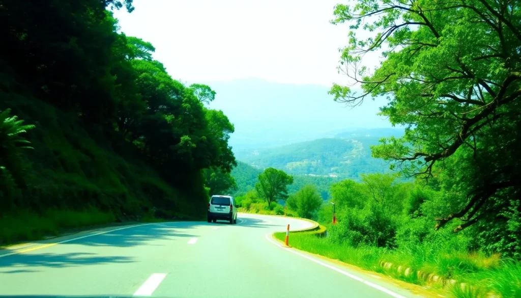 Road winding through Margalla Hills with vehicles driving up to Pir Sohawa