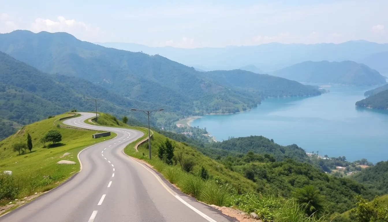 Scenic road through hills leading to Kaptai Lake, Bangladesh with lush green mountains and clear blue sky