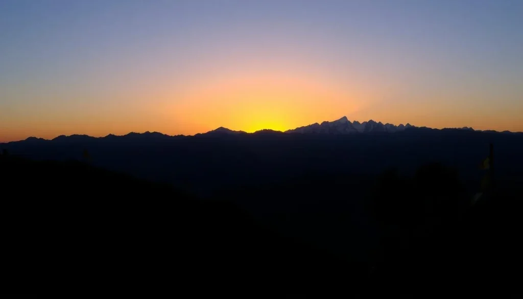 Sunrise over the Himalayas viewed from Dhulikhel with golden light illuminating snow-capped peaks