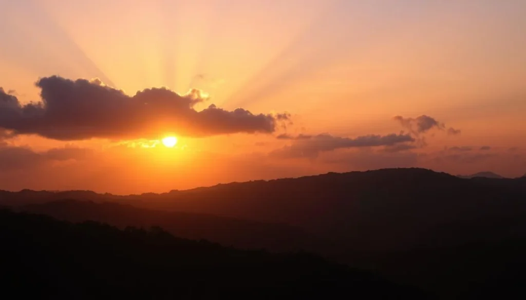 Sunset over Bandarban hills with silhouettes of mountains and golden sky