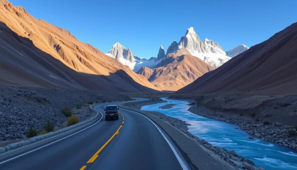 The Karakoram Highway winding through mountains with the Passu Cones in the background