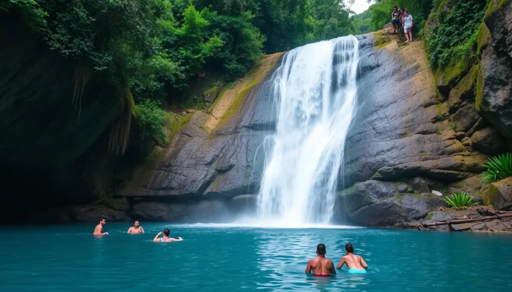 Tumalog Falls in Oslob with tourists swimming in the blue water Tumalog Falls in Oslob with tourists swimming in the blue water