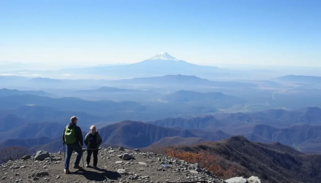 View of Mount Fuji from the summit of Mount Kintoki in Hakone with hikers enjoying the panorama