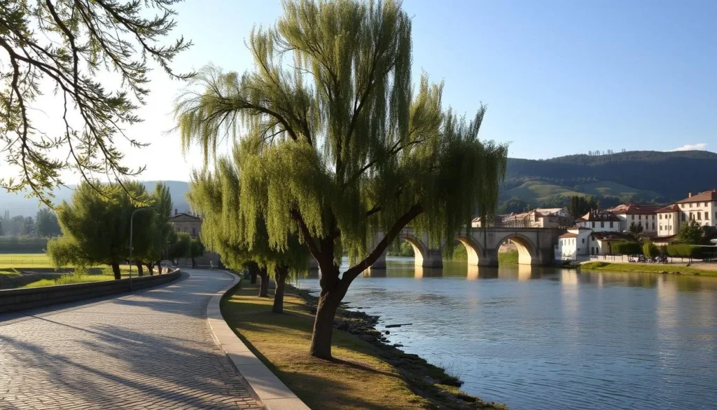 A serene riverside landscape in Gabrovo, Bulgaria, bathed in warm, golden afternoon light. The Yantra River flows gently, its calm surface reflecting the historic stone bridges and charming buildings lining the banks. In the foreground, a cobblestone promenade invites visitors to stroll and admire the picturesque scene. Mature trees sway in a gentle breeze, their dappled shadows dancing across the path. The middle ground features a beautifully restored stone bridge, its elegant arches spanning the river. In the distance, rolling hills and lush greenery create a peaceful, pastoral backdrop. The overall mood is one of tranquility and timeless beauty, capturing the essence of Gabrovo's historic charm.