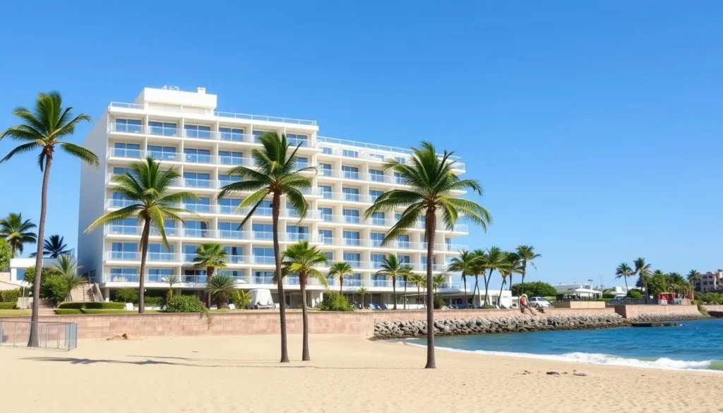 Beachfront hotel in Reñaca with ocean view balconies and palm trees
