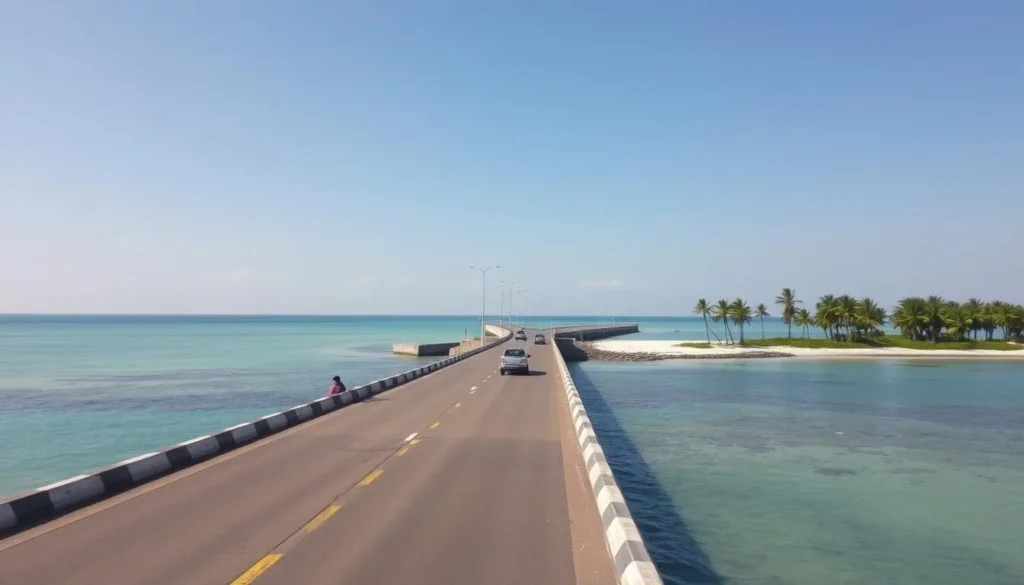 Causeway connecting Jaffna Peninsula to Velanai Island with vehicles crossing Causeway connecting Jaffna Peninsula to Velanai Island with vehicles crossing