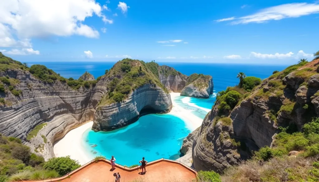 Kelingking Beach viewpoint on Nusa Penida with its famous T-Rex shaped cliff formation and turquoise waters below Kelingking Beach viewpoint on Nusa Penida with its famous T-Rex shaped cliff formation and turquoise waters below