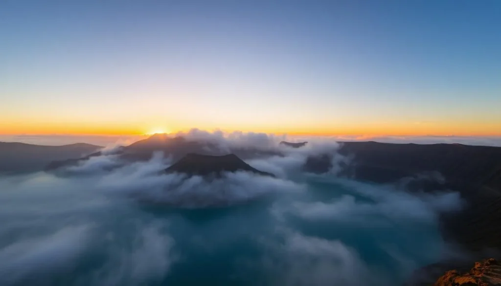 Sunrise view over Lake Segara Anak with morning mist rising from the water Sunrise view over Lake Segara Anak with morning mist rising from the water