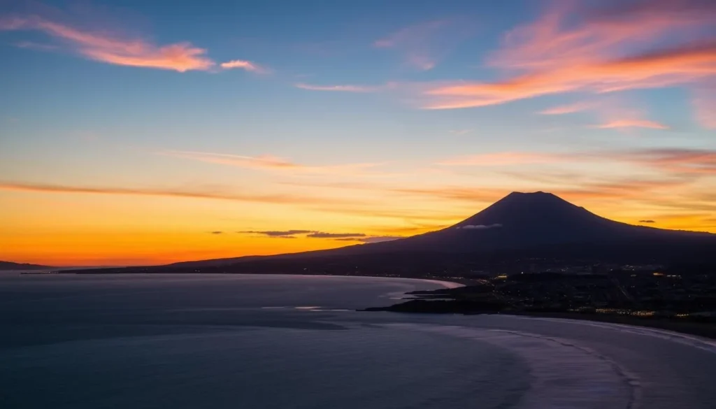 Sunset over New Plymouth coastline with Mount Taranaki in the background - best things to do in New Plymouth New Zealand Sunset over New Plymouth coastline with Mount Taranaki in the background - best things to do in New Plymouth New Zealand