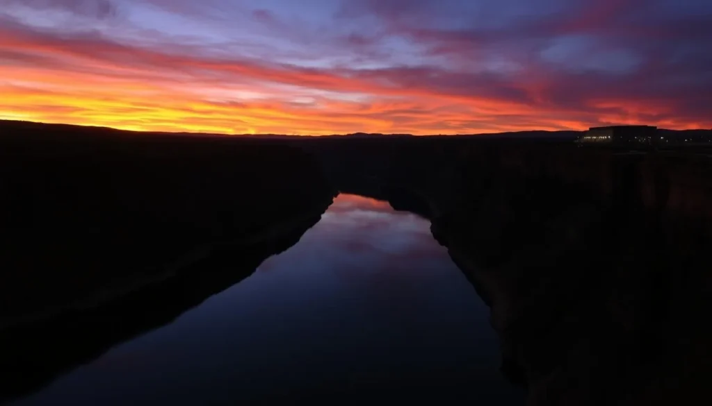 Sunset over the Rio Grande Wild and Scenic River with silhouetted canyon walls Sunset over the Rio Grande Wild and Scenic River with silhouetted canyon walls