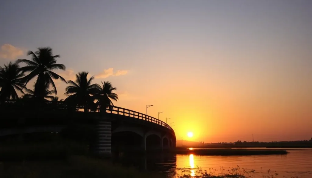 Sunset view of Río Cauto bridge near Contramaestre with golden light reflecting on water Sunset view of Río Cauto bridge near Contramaestre with golden light reflecting on water