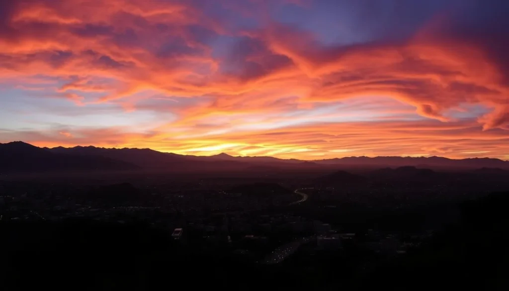 Sunset view over Ambato with city lights beginning to twinkle and mountains in background Sunset view over Ambato with city lights beginning to twinkle and mountains in background