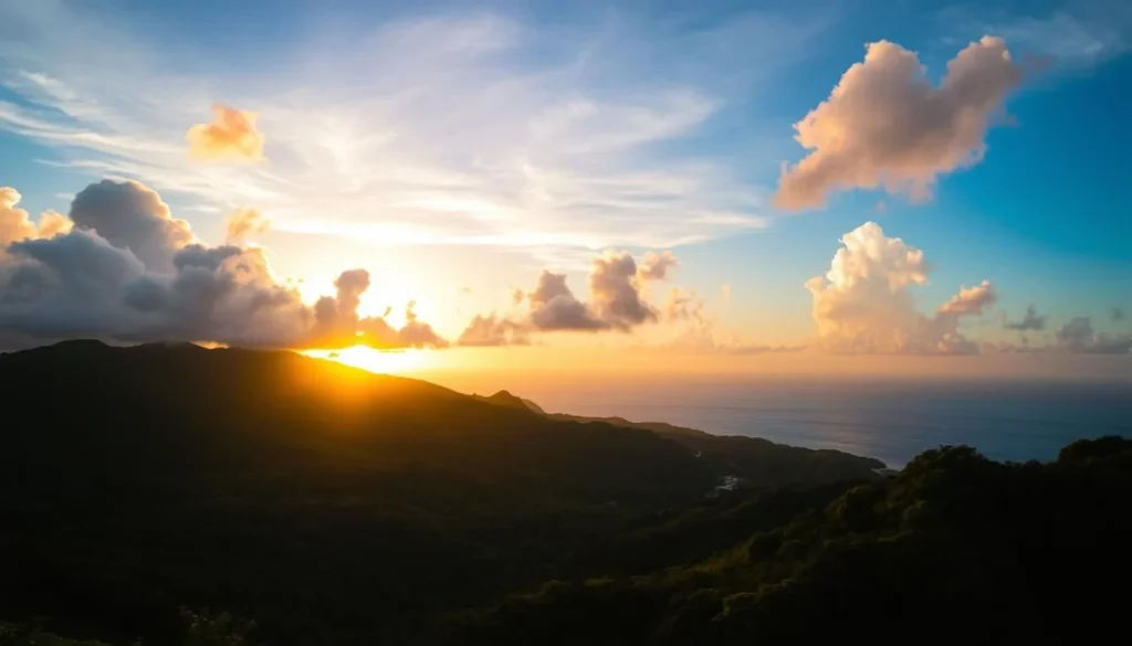 Sunset view over Dominica's lush mountains with the Caribbean Sea in the background