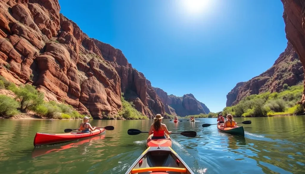 Tourists canoeing through Nitmiluk (Katherine) Gorge surrounded by towering red cliffs