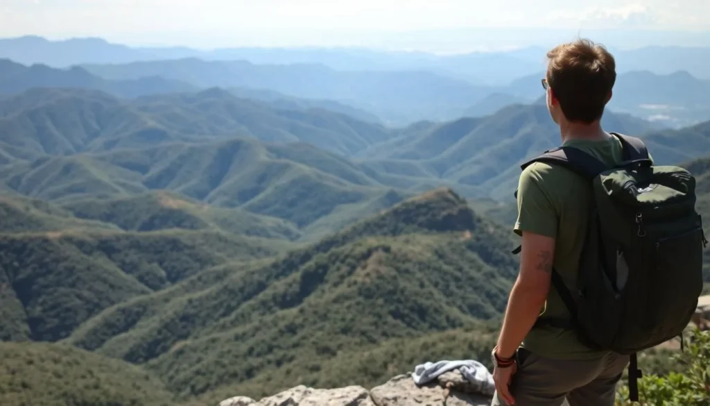 Traveler enjoying the view from a mountain lookout in the Cordillera Central, Puerto Rico