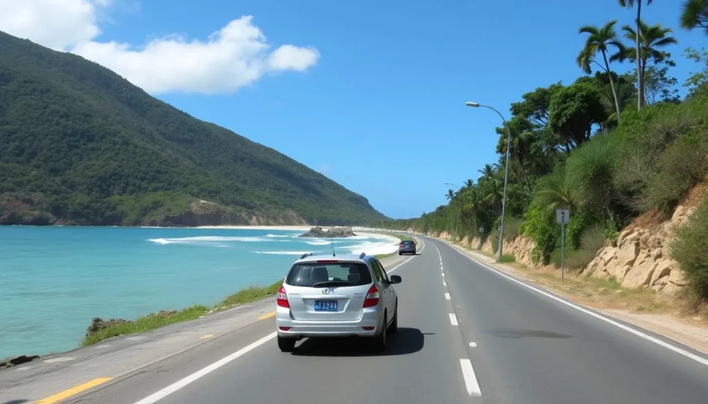 Coastal road near Sainte-Anne Beach Guadeloupe with rental cars