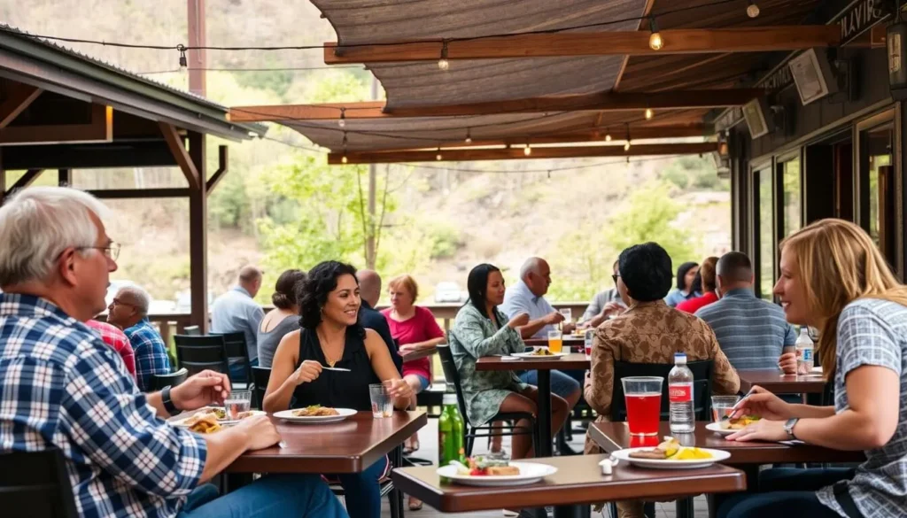 Outdoor dining at a restaurant in downtown Ohiopyle with forest views
