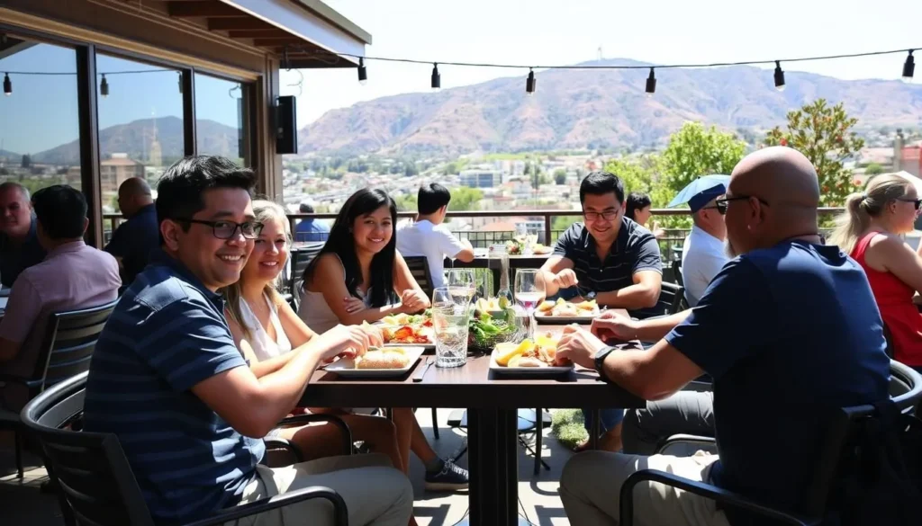 People enjoying outdoor dining with views of San Bruno Mountain People enjoying outdoor dining with views of San Bruno Mountain