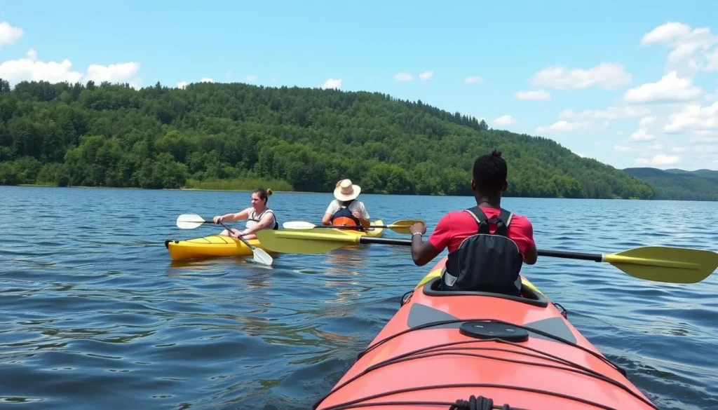 People kayaking on Lake LeBoeuf with lush green shoreline in background People kayaking on Lake LeBoeuf with lush green shoreline in background