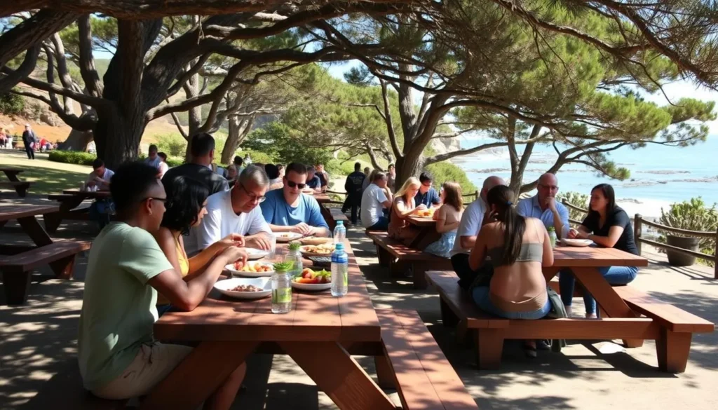 Picnic area at Russian Gulch State Park with diverse families enjoying meals with coastal views Picnic area at Russian Gulch State Park with diverse families enjoying meals with coastal views